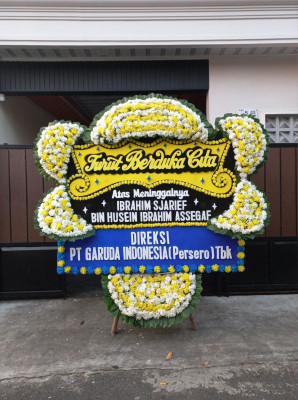 Papan Bunga Duka di Warung Muncang